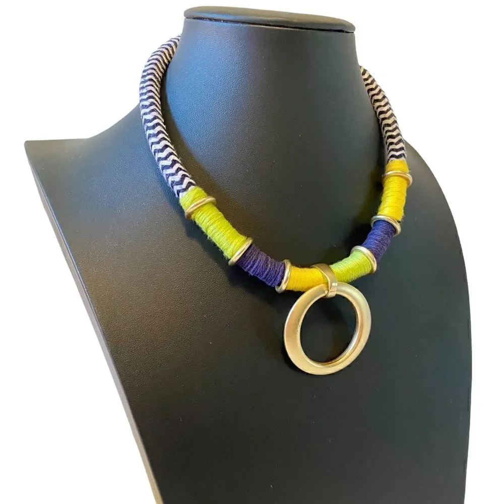 Multi Colored Thread Necklace w/ Matte Gold Toned circle Pendant.